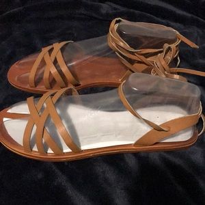 Tan crisscross ankle wrap sandals